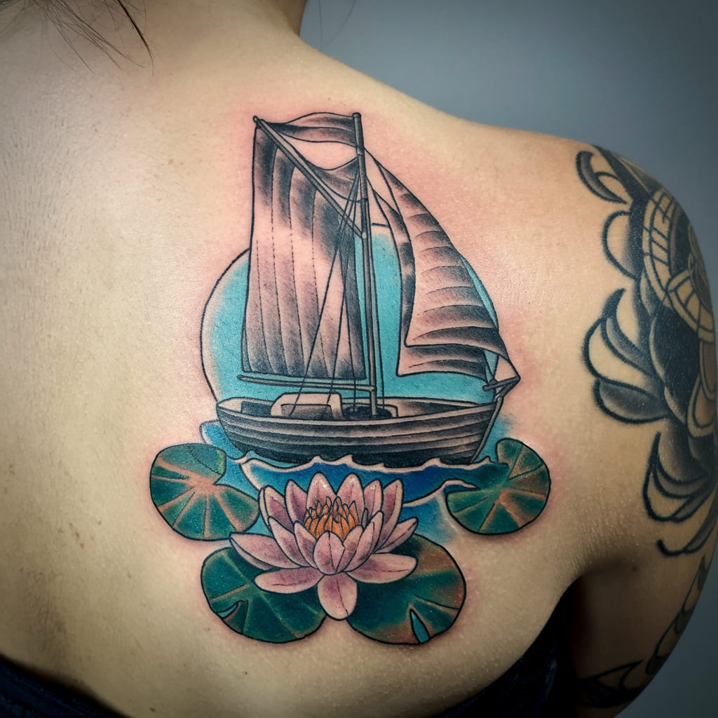 Water Lily and a Vintage Sailboat