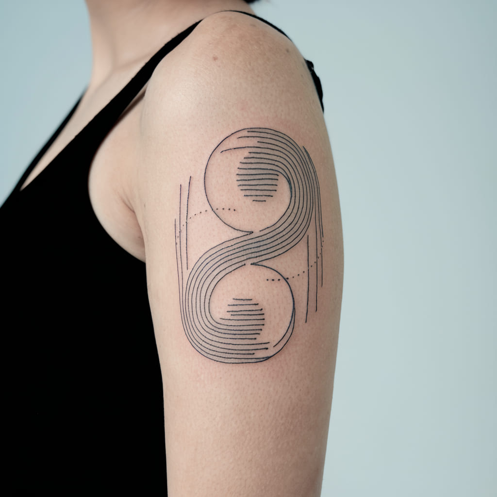 Abstract Yin Yang Lines Tattoo